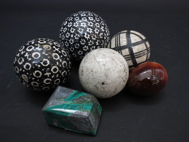 Vintage Polished Stone Balls Semi Precious Stones: A collection of vintage polished stone balls and polished semi precious stones. Largest ball measures about 3 1/2 inches across.