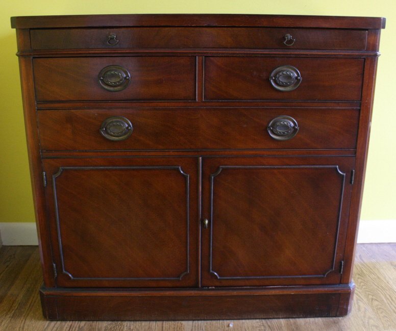 Vintage DREXEL Mahogany Classic Credenza: with top tray and three drawer and open one-shelf bottom. Original regency hardware. In good condition. Measures 36 W by 18 D and 34 inches H. Property of a Scarsdale, NY Estate.