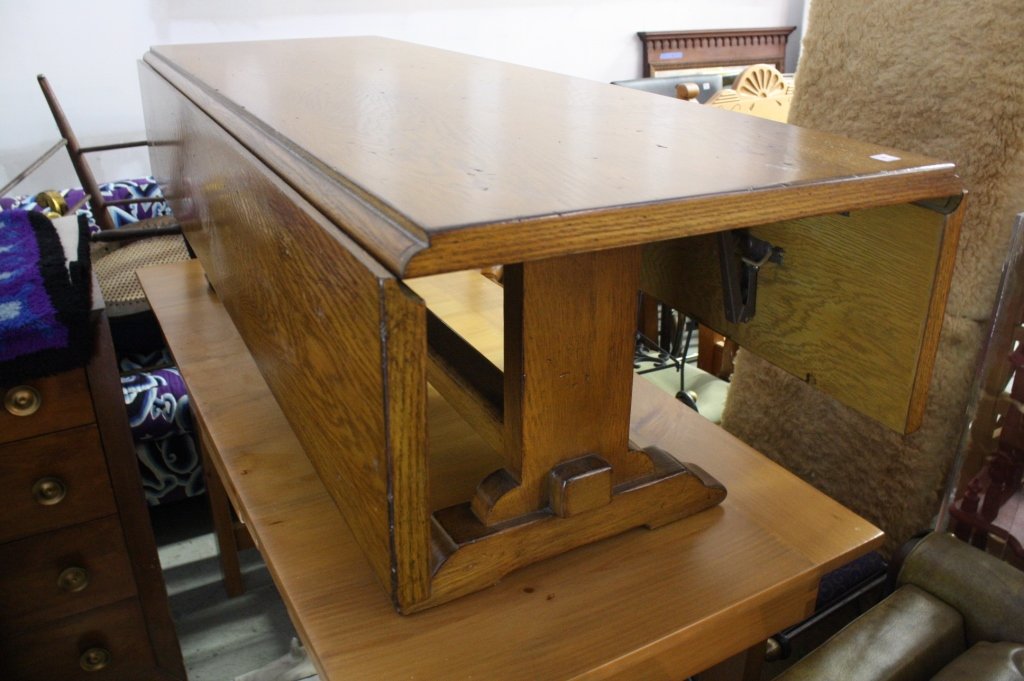 Vinatage Pine Drop Leaf Coffee Table: Rustic Cross Beam Support between two pedestal legs.