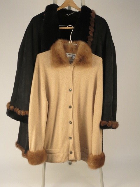 Vintage Lot of Two Fur Sweaters: Vintage lot of two fur sweaters consists of 1 BUONUOMO NEW YORK MILAN SIZE L MADE IN SCOTTLAND 100 PERCENT CASHMERE tan sweater with tan fur collar and fur cuffs on the sleeves, 1 black with brown fur