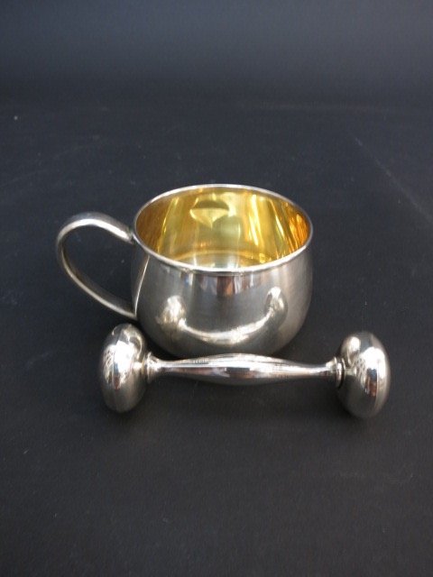 Antique Sterling Baby Cup and Rattler: An antique Sterling baby cup and rattler. belonged to the father of the current owner. At least 90 years old. the cup measures about 4 inches across.