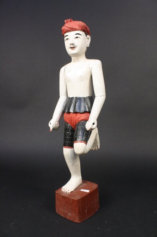 Vintage Southeast Asian Carved Wood Figure: A vintage Southeast Asian carved wood figure. Possibly from, Java, Bali, Indonesia or Malaysia. Measures about 22 tall.