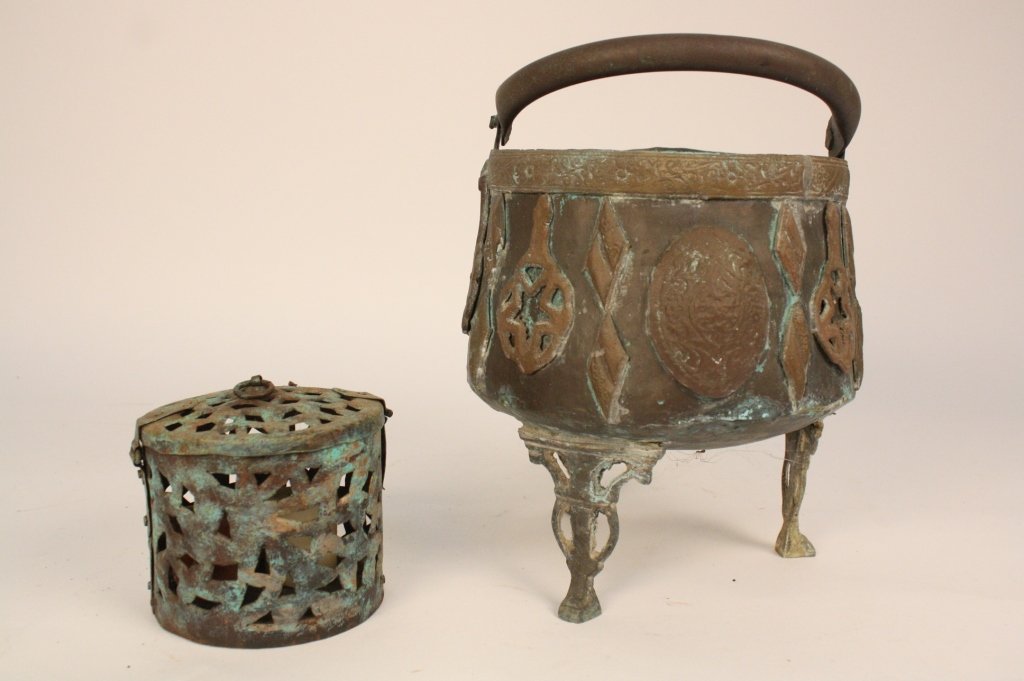 Wrought Iron Fireplace Grid and Cast Iron Pot: Fireplace grid has yellow glass and starburst design and Cast iron pot stands on three legs