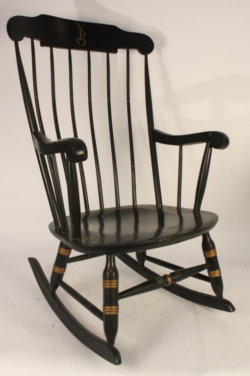 Vintage Yale Black Rocking Chair: Vintage black rocking chair marked with Yale University symbol YPO, painted black with gold accent, labeled NICHOLS Stone Company Gardener, Mass, measures 41 inches tall by 24 inches wide by 29 inches