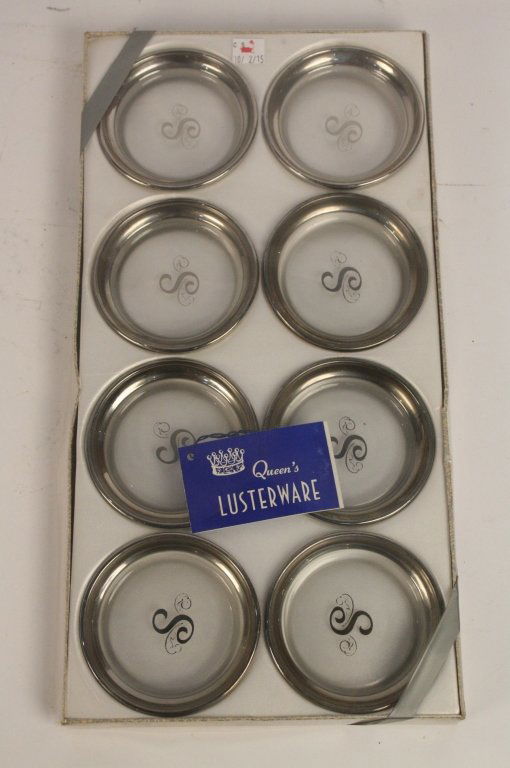 QUEENS LUSTERWARE Silver S Coaster Set: Set of 8 QUEENS LUSTERWARE S glass and silver toned coasters with the letter S in the center of each glass coaster and silver on the rim, set in original box, individual coaster measuring in inches 1H