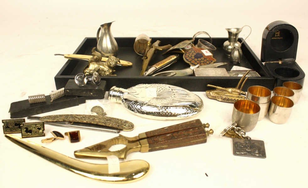 Group Silver sterling pewter bone brass: Lot includes fish form flask, brass foo dog, napkin rings, match box, holland marked pewter, belt buckles, brass alligator nut cracker, paperweights, fish knife, cufflinks, antique bone and metal razo