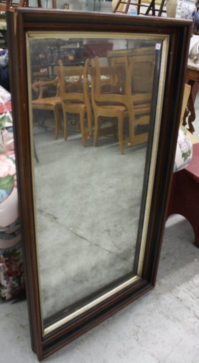 Antique Mahogany and and Gold Painted Mirror: Mahogany and ebony framed mirror, believed original glass, measures 22 inches wide by 40.5 inches tall, some chips to frame, property of Waccabuc Estate