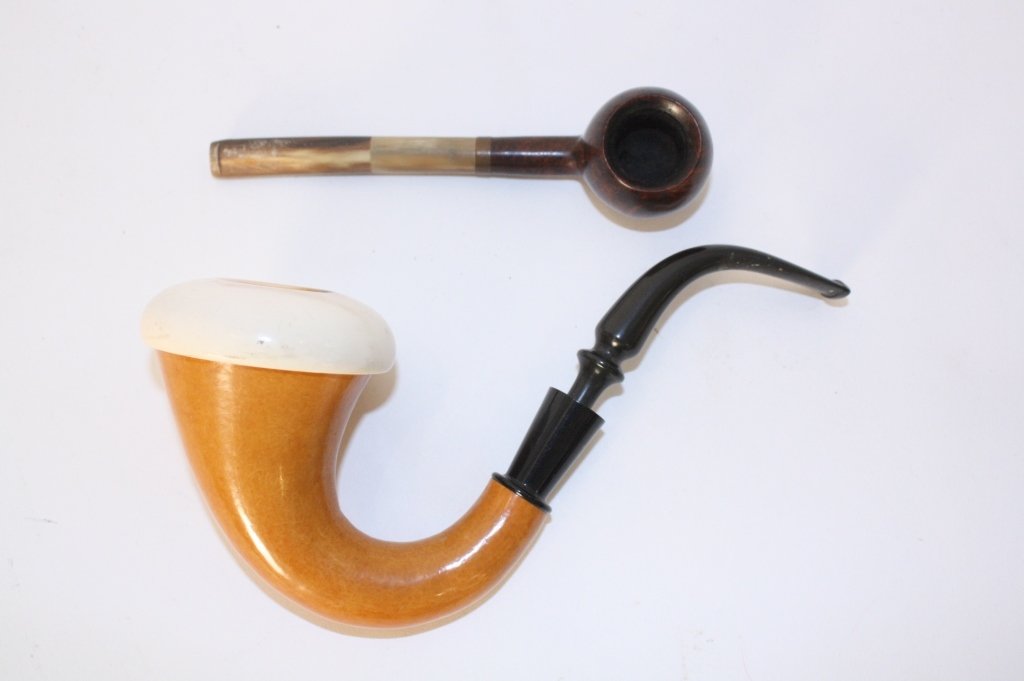 Two Vintage Carved Pipes: Two vintage carved pipes, various woods, larger Sherlock Holmes style, measures 8 inches length