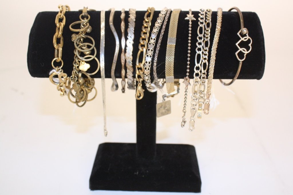 Vintage Gold and Sterling Bracelets: Vintage jewelry group lot. includes 15 bracelets. Sterling and gold RGP, bangles and chains one marked for Italy.