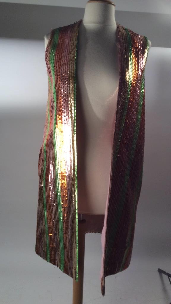 Sequined Striped Vest Coat: sparkly 70's style striped sequined vest coat. Measures from neck to hem app 36 inches. Lined in light pink