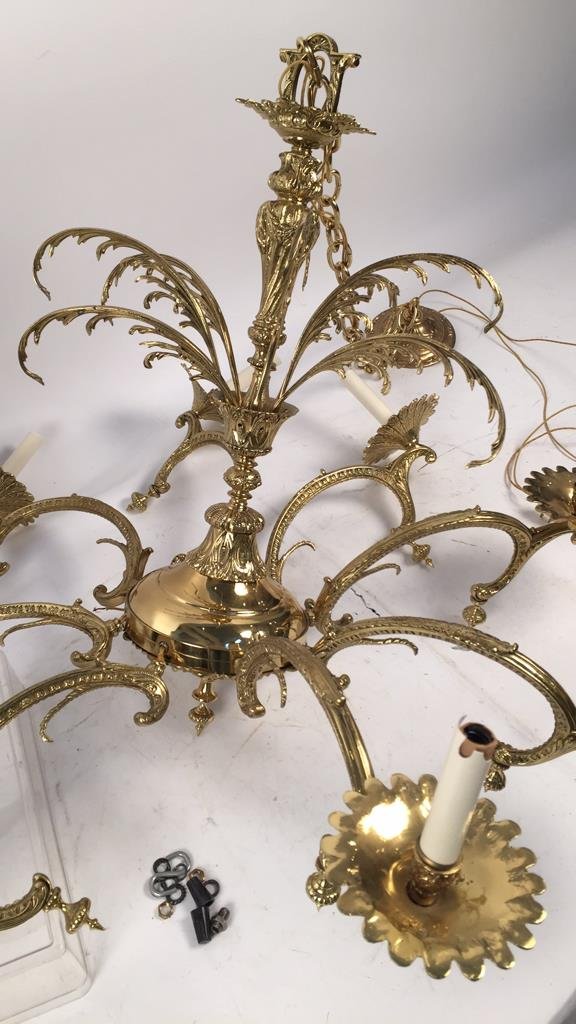 Large Brass ROCOCO Eight Light Chandelier: All pieces are available, however, the chandelier needs to be completely assembled. Needs a couple of standard hardware bolts and washers. Measures apprx. 36 inches wide, complete fixture 28 inches hi