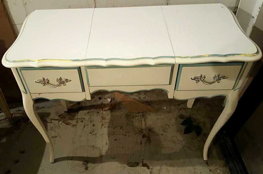 Country French Style Small Makeup Desk: Country French Style small makeup desk, hand painted, white painted with green trim, brass hardware, two drawers, top opens to mirror, measures 40w by 19d by 30h