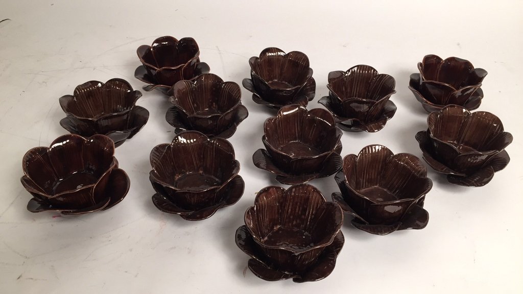 CAROL STUPELL St of 12 Pottery Bowls: Hand made and crafted, leaf form bowls, one has a chip, chocolate brown glaze, measures 6 inch diameter by 3 inches tall