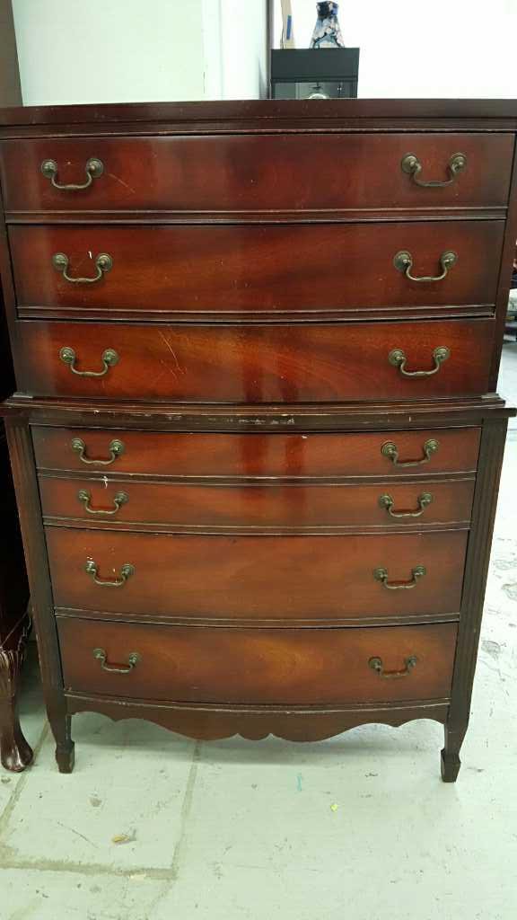 DIXIE Mahogany Chest on Chest Highboy: DIXIE Mahogany chest on chest highboy, six drawer, carved skirt, some chips and scrapes, measures 52 inches tall by 35 inches wide by 17 inches deep