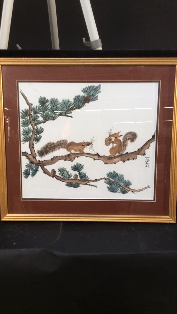 Gloria C Doyle Chinese Watercolo: scene of two squirrels on a Pine branch. Signed. Gold leafed frame and matted. Measures app 19 by 20 inches