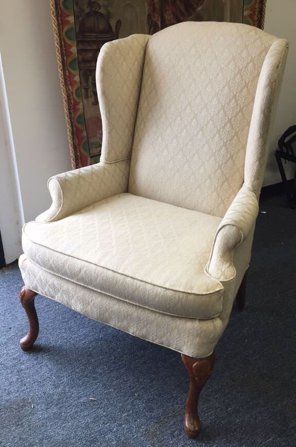 Upholstered wingback chair with roll arms (1 of 7)