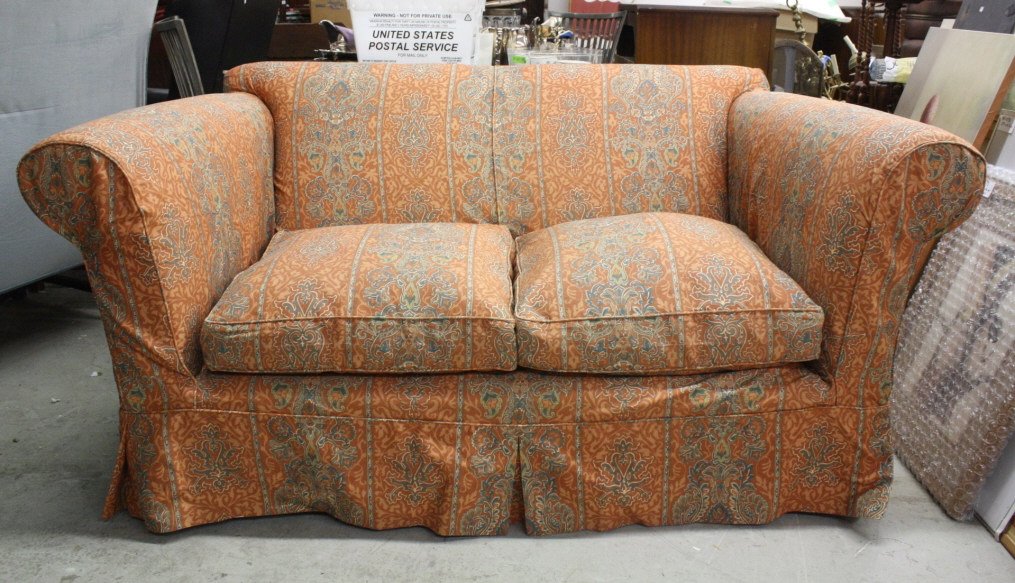 BENNISON Love seat with additional Slip Cover: Like Two sofas in one, both sets of fabric, original and extra cover from English Fabric House BENNISON Fabric very good condition. Brass Nail Head Trim. Length 59 inches Depth 38 inches and height 35