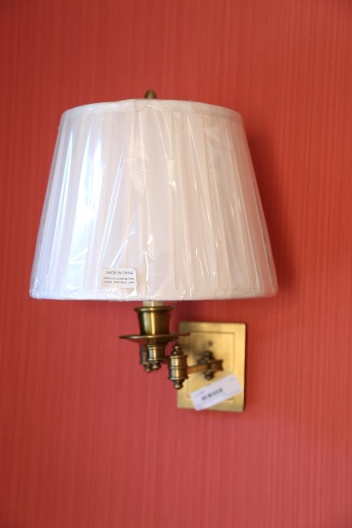 Pair triple swing arm brass lamps: Purchased at Bedford Lighting and Home each measures 13 inches H, extension to 18.5 inches Back Plate 3.5 by 4.5 inches. Finished in hand rubbed brass, Silk box pleat shade. Excellent Condition. Origi
