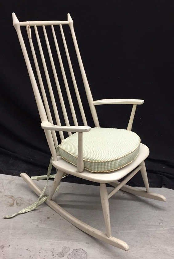 Classic Mid Century Rocking Chair with Arms Clean style: Clean style paint shows wear complete with custom tieback seat cushion makes it perfect for nursery. Spindle back with cone shape ears. Measures 44 x 24 x 35