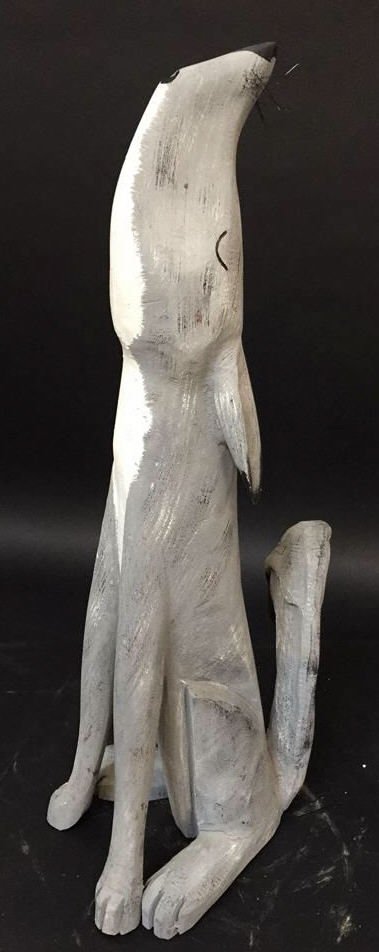 Carved Decorative Howling Coyote RORY ALVAREZ '98. Folk: RORY ALVAREZ '98. Folk art made of wood. Rustic South Western Style. Measures 31 x 16 x 12