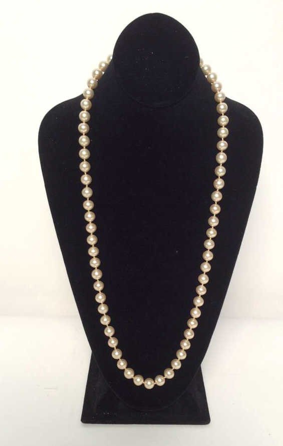 GIVENCHY Pearl Necklace: Pearl necklace, individually knotted, gold clasps marked GIVENCHY, strand measures in inches 30