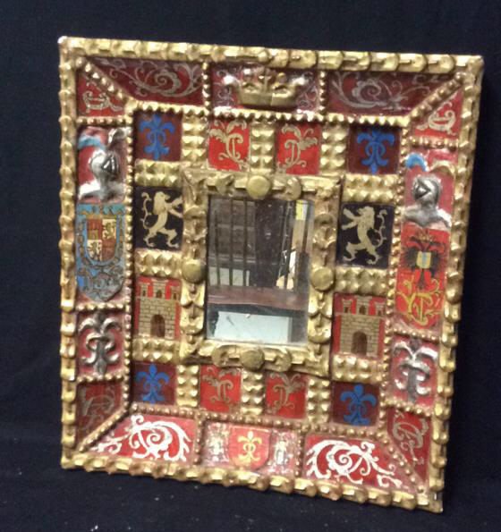 Carved Mirror Equeie Panels Circa 1850: Decorative mirror that was made in 1850. Decorative designs on it, has a very vintage look it. Measures 25 x 22.