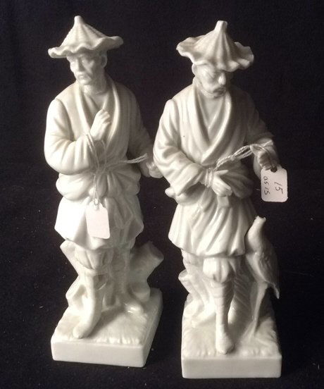 Pair Of Fitz & Floyd Figures: Pair of Fitz & Floyd Figures, signed and marked on bottom, one figure has a chip in piece, they measure 8 inches