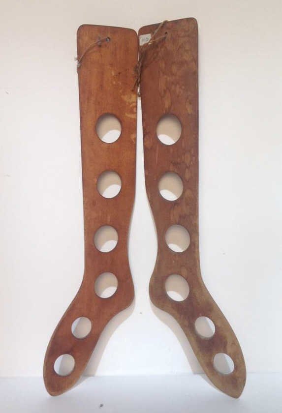 Wood Carved Sock Forms: Pair wood carved sock forms, distressed, measuring In inches 4x24