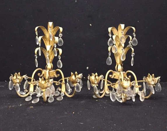 Pair of Crystal Candle Sconces: Pair of sconces, each with 3 arms and dangling crystals, arms and patterns on sconces are gold painted metal, each sconce has a hook on the back for hanging, condition consistent with age, each sconce