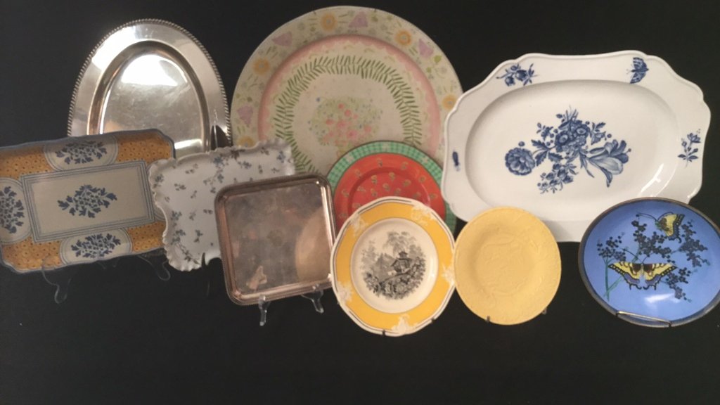 Decorative Platter Group: Set of 10 decorative platters. Ceramic and metal. Floral patterns. Labels includes Borldado hieneria, Minton, Harrods, Gilman caramore, Grazia derunta, and more. Largest measures 19 inches round