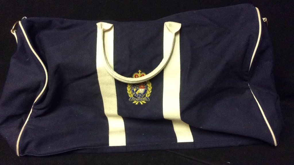 Vintage blue Ralph Lauren Duffle Bag: Vintage blue Ralph Lauren Duffle Bag with white handles and outskirts of the bag, in good condition, measures 12x22.5