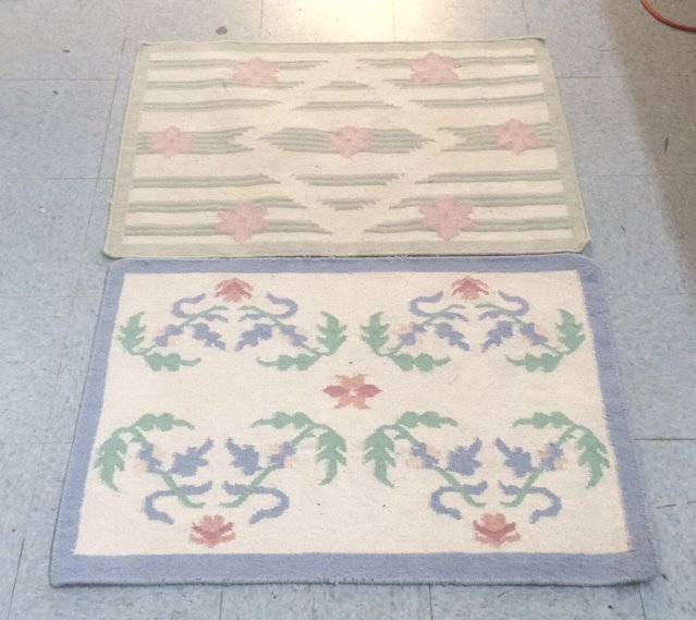 2 Vintage Handmade Dhurrie Rugs: Lot includes 2 hand made vintage Duhrrie rugs both measuring in inches 25x35, used, no rips or holes, ware visible