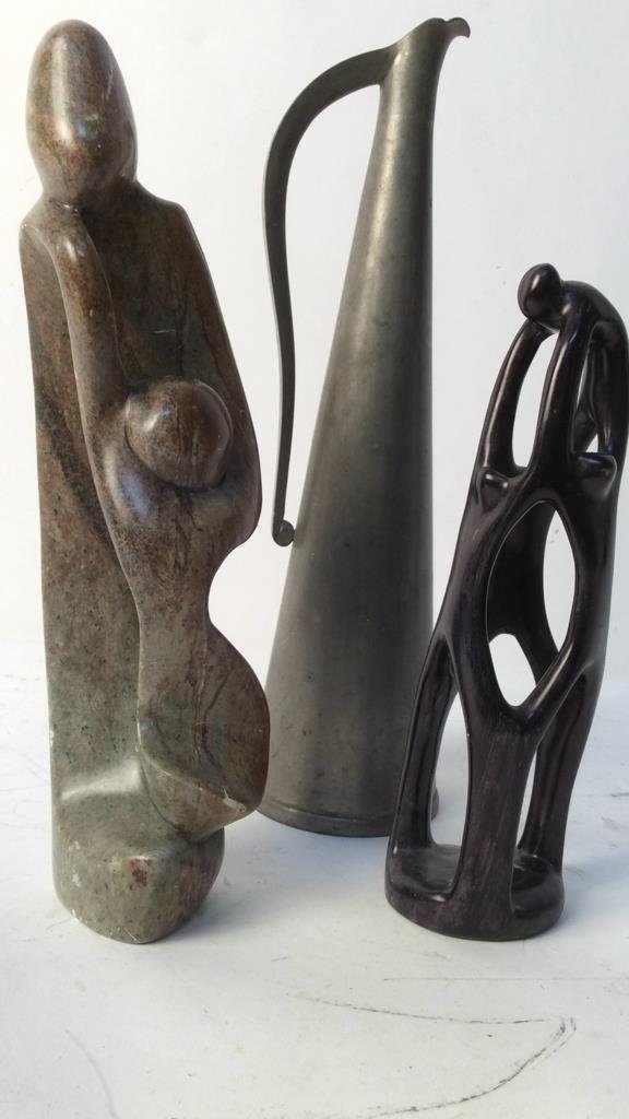 group lot marble sculpture Kenya sculpture N: Norway pitcher group lot includes mother and child marble sculpture form measures app 13 inches high, ebony parent and child form sculpture and sleek pewter skinny pitcher marked Norway measures app 1