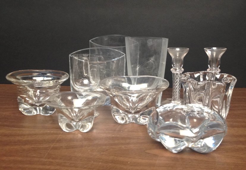 11 Piece Sign Glass Crystal Lot: 11 piece signed glass crystal lot includes marked Orofores bowl measuring in inches 6.5x2.5 no cracks or chips, 1 wavy bowl marked Tapio Wirkkala 14/1985 measuring in inches 5x4 no cracks or chips, 1 