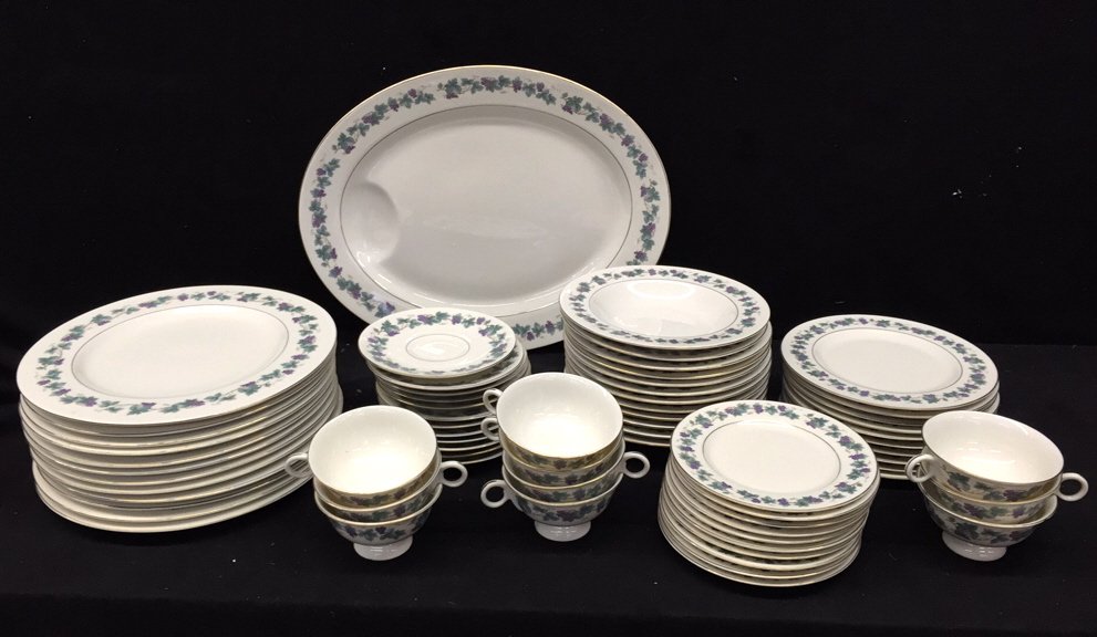 THEODORE HAVILAND New York China: Arbor pattern signed and numbered on reverse. One oval meat platter with grape leaf boarder and pinstripe trim. 12 dinner plates, 10 salad plates, 10 butter plates, 12 bowls, 12 saucers and 10 tea cup