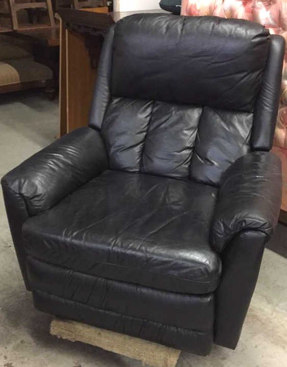 Black Faux Leather Recliner: Generous seat with side lever to recline. Very good condition.