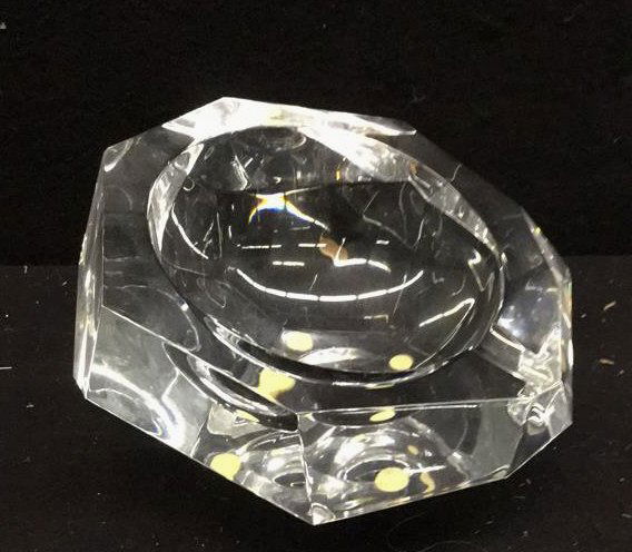 Baccarat Candy Dish: Baccarat bowl or candy dish. Crystal. Cut into geometric design. Measures 4 inches high by7 inches wide