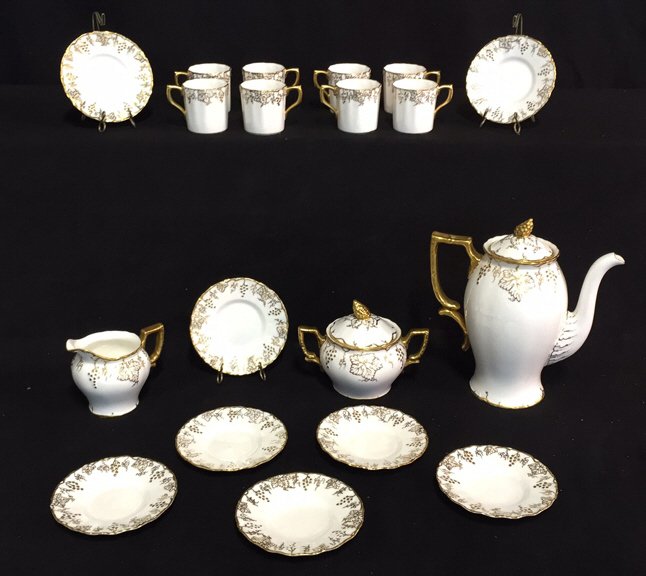 ROYAL CROWN DERBY Tea Set VINE: Signed made in England Reg No 639130 Vine (Bone China). Gold leaf trim and grape leaf motif. Scalloped edges and hand painted handles. Excellent condition. 8 saucers, 4-1/2 inches in diameter. One lid