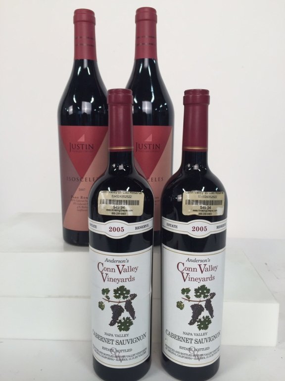 Group of 2 Isosceles 2007 & 2 Right Bank 2005: 2 bottles Justin, Isosceles, Paso Robles, United States, Californian Red Blend. This wine is luscious, powerful and complex. It has a big dose of berries and smoke on the nose. On the palette it offer