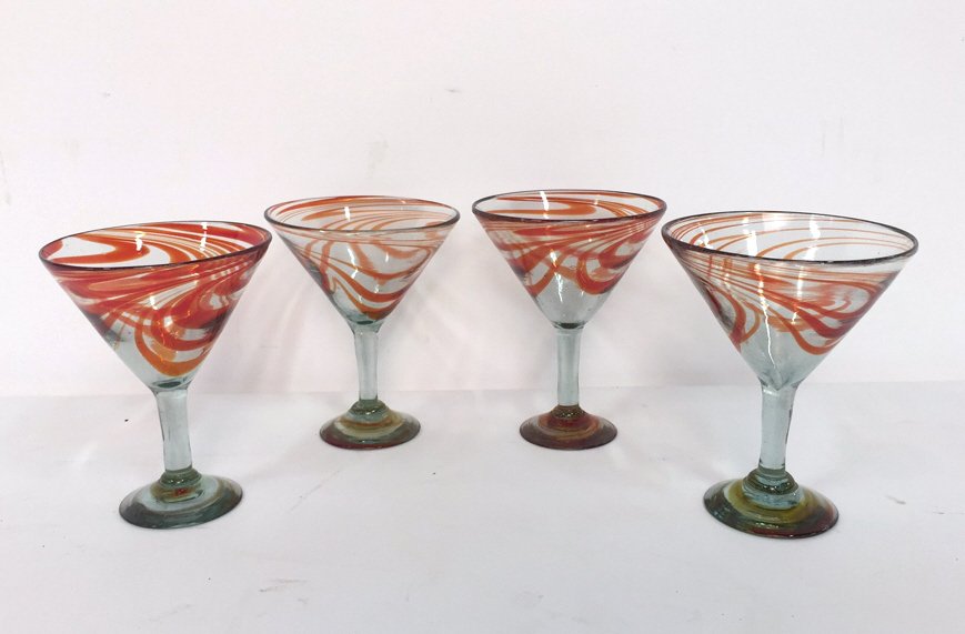 Swirl Orange Handmade Martini Glasses: Lot includes 4 Piece set of hand made glass martini glasses, thick glass swirls of orange, 1 has small chip at base, vintage, measure in inches 6x7