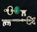 2 Gold Colored Key Shaped Pins