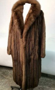 Russian Sable Vintage Fur Coat: Ladies fur coat in excellent condition custom made, silk lined and hand pieced from finest pelts Russian Sabble. Original price was $75,000 from Brooklym Furrier Herbert Schleifer. Measurements are ne