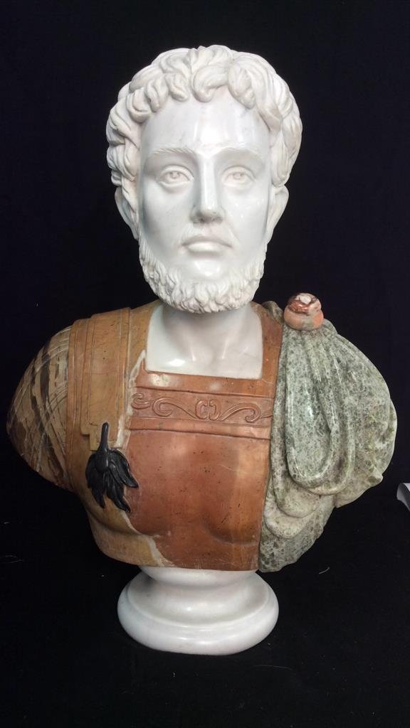 Grecian Hippocrates Carved Marble Bust: Carved marble Grecian Hippocrates form, colored marbles include white, carera white with black vein, green marble, orange marble, black marble, golden marble, brown and gold striated armor. Different 