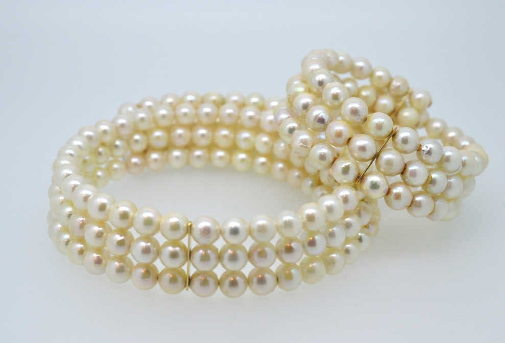 Classic 3 Strand Pearl Choker Necklace & Bracelet: Genuine Classic genuine natural pearls, 6 1/2 mm creamy Pearls with 14K Yellow Gold Necklace. Matching Bracelet included. Both pieces are adjustable. New merchandise, from old stock. Guaranteed authen