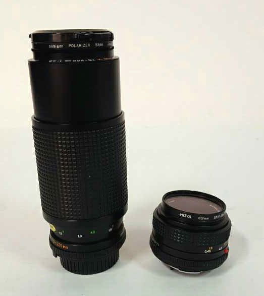 Two Minolta Lens: One lens: Minolta MD 50mm 1:1.7, Hoya 49mm skylight (1B) One lens: Minolta MD Zoom Rokkor-X 75-200mm 1:4.5, samigon Polarizer 55mm both lens made in Japan