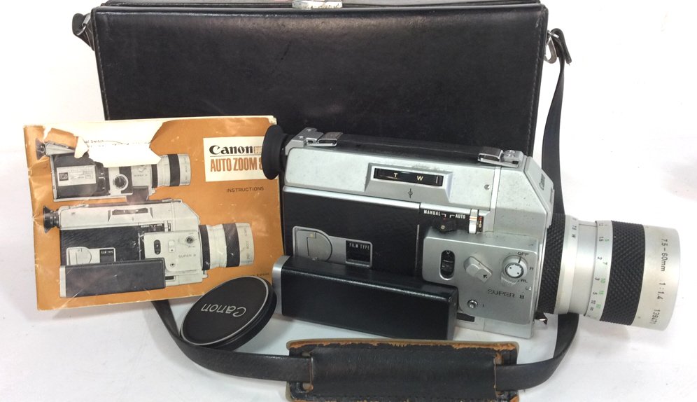 Canon Super 8 Movie Camera: With original carry case strap and instruction. Made in Japan . Canon Zoom lens C-8 , with lens cap