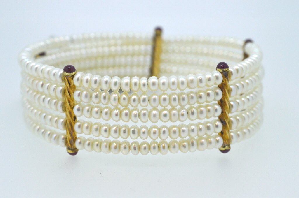 Pearl Choker Necklace 14K Gold Ame Stone Accents: Crafted piece made of 4.5 mm Natural genuine Pearls and adorned with twists of 14K Gold and Ame Stone. Adjustable fit. Guaranteed authenticity. New merchandise from old stock.