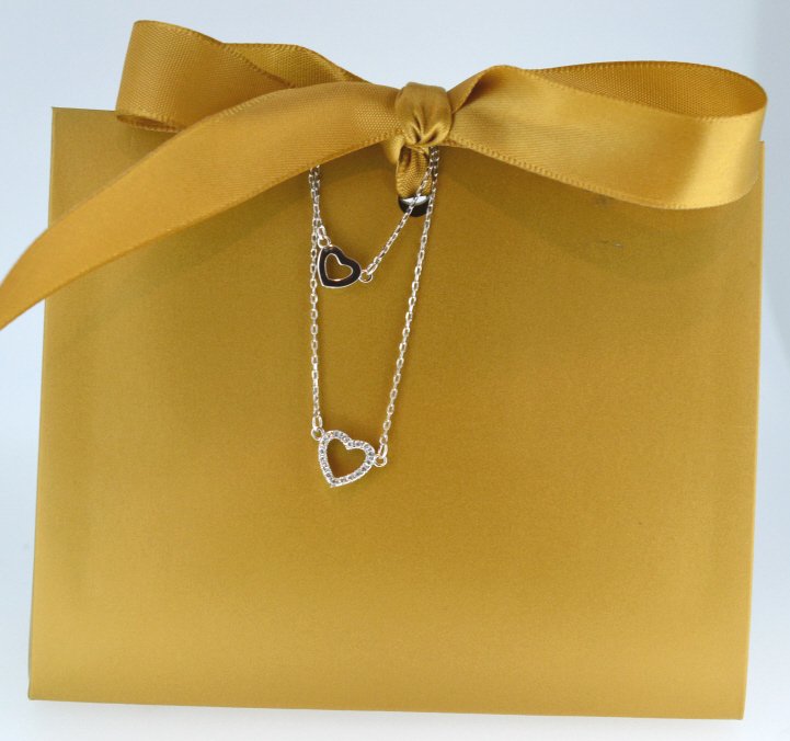 16"-18" Double Love Necklace 9.25 Sterling Silver: Two Hearts at different lengths on a double chain necklace with adjustable clasp .