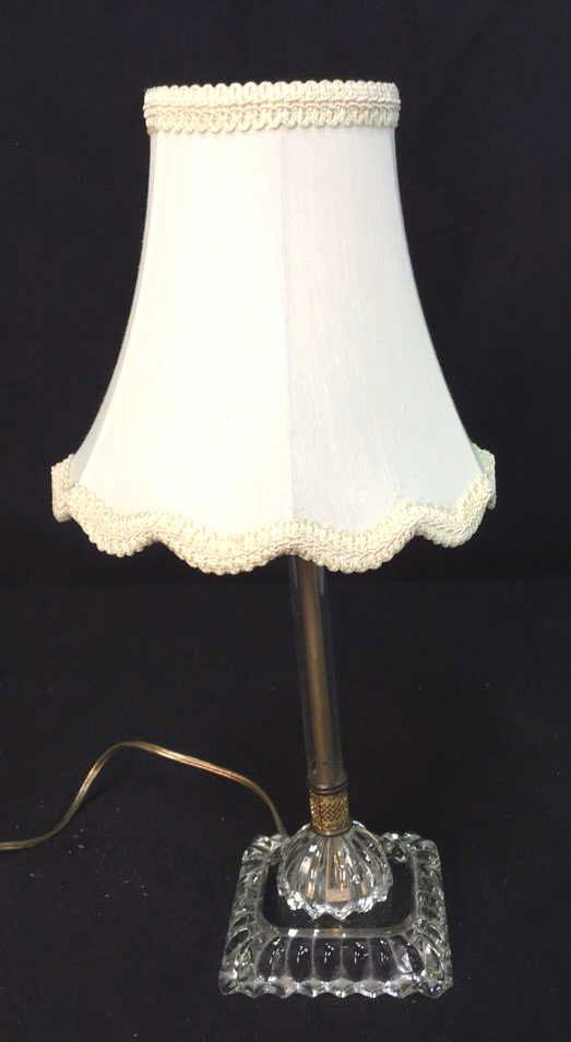 Vintage Candlestick Table Lamp: Vintage candlestick table lamp ideal for end or side or bedside table. Glass base with linen scalloped shade. Measures 16h x 8w inches.