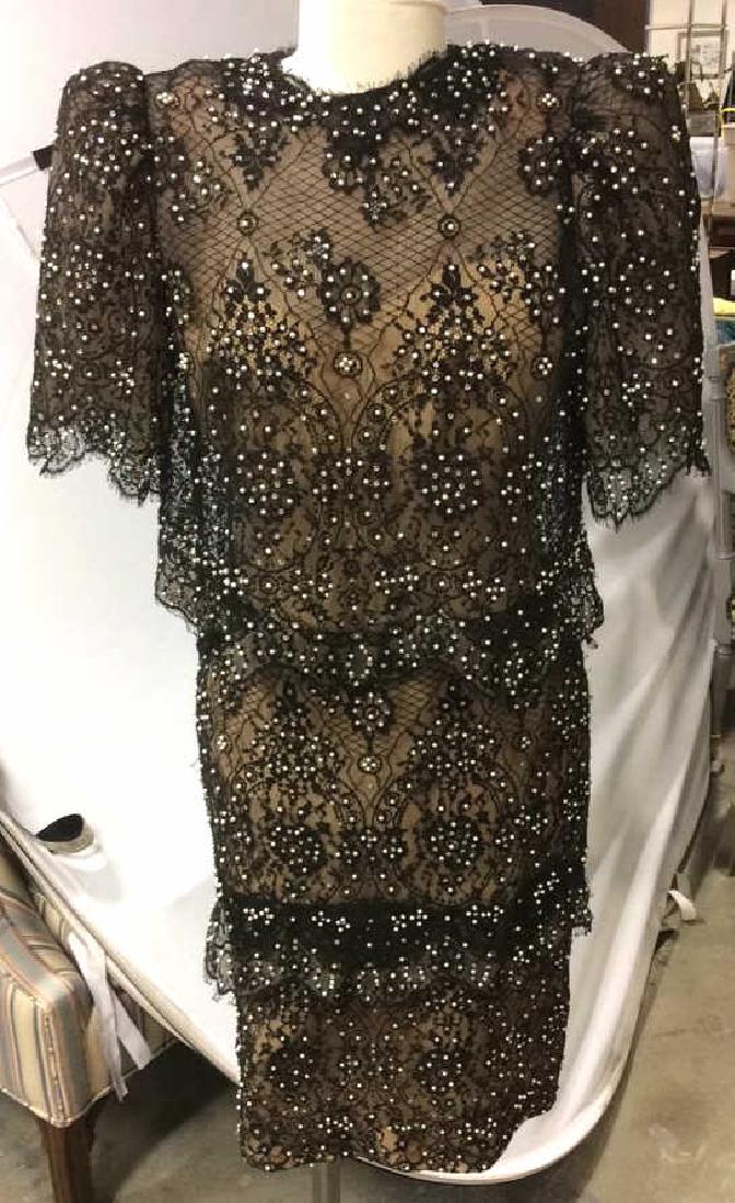 Vintage Black Lace Seed Pearls Ladies Dress: Three layered dress of black lace with attached nude slip, zipper back, adorned with seed pearls and sequins. Sized medium